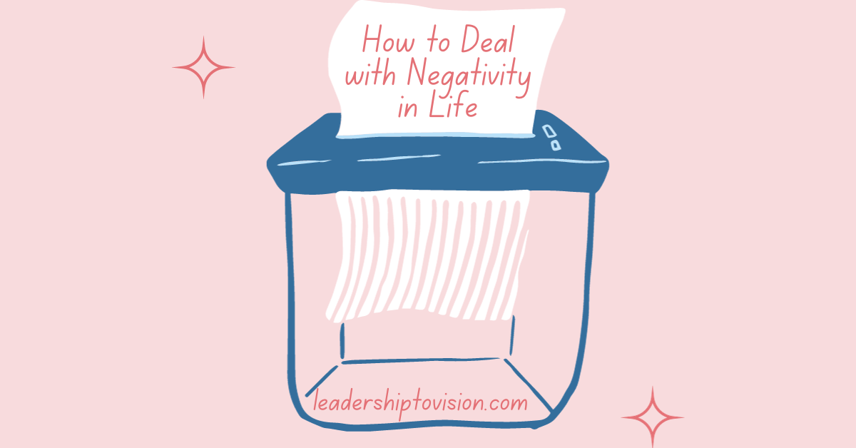 how to deal with negativity in life picture title with a paper that is getting shredded and a website address to leadership to vision